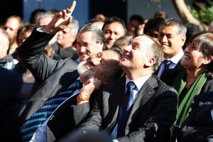 John Key and Pita Sharples cosy up at a hui held last year. Photo / Kenny Rodger