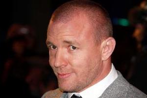 Director Guy Ritchie is following his ex-wife Madonna into the music industry - by launching his own record company. Photo / AP