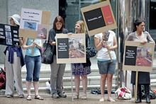 Sea Shepherd supporters protest outside the Japanese Consulate in central Auckland yesterday. Photo / Steven McNicholl Sea Shepherd supporters protest outside the Japanese Consulate in central Auckland yesterday. Photo / Steven McNicholl
