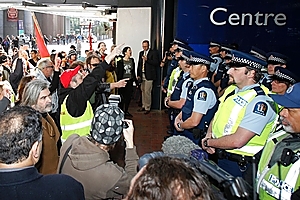 Police block protesters outside the National Party Annual Conference. Photo / NZPA