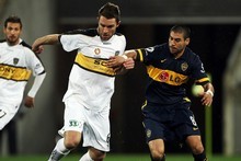 Tim Brown of the Phoenix competes with Jesus Mendez of Boca Juniors during the pre-season friendly match at Westpac Stadium. Photo / Getty Images Tim Brown of the Phoenix competes with Jesus Mendez of Boca Juniors during the pre-season friendly match at Westpac Stadium. Photo / Getty Images