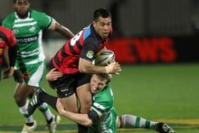 Tu Umaga-Marshall of Canterbury is tackled by Hadleigh Parkes of Manawatu. Photo / Getty Images Tu Umaga-Marshall of Canterbury is tackled by Hadleigh Parkes of Manawatu. Photo / Getty Images