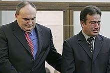 Brad Shipton comforts Bob Schollum during their sentencing in 2005. Photo / Mark Mitchell Brad Shipton comforts Bob Schollum during their sentencing in 2005. Photo / Mark Mitchell