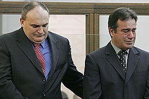 Brad Shipton comforts Bob Schollum during their sentencing in 2005. Photo / Mark Mitchell