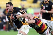 Daniel Ramsay breaks the tackle of Waikato's Brendon Leonard during Wellington's win last night. Photo / Getty Images Daniel Ramsay breaks the tackle of Waikato's Brendon Leonard during Wellington's win last night. Photo / Getty Images