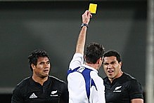 All Black centre Isaia Toeava receives the yellow card from referee Craig Joubert, despite the protest of Mils Muliaina. Photo / Mark Mitchell All Black centre Isaia Toeava receives the yellow card from referee Craig Joubert, despite the protest of Mils Muliaina. Photo / Mark Mitchell