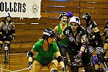 The Dead Wreckoning face off against Mascara Massacre in the Pirate City Rollers league. Photo/ Matalin Hatchard. The Dead Wreckoning face off against Mascara Massacre in the Pirate City Rollers league. Photo/ Matalin Hatchard.