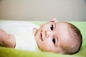 A study has found that giving a baby a spoonful of sugar before an injection or blood test may alter its expression without lessening its pain. Photo / Thinkstock