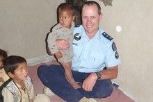 Andrew Berry, seen here with Tamim, used some of his own money to pay for the toddler's surgery. Photo / Supplied Andrew Berry, seen here with Tamim, used some of his own money to pay for the toddler's surgery. Photo / Supplied
