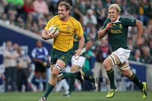 Wallabies captain Rocky Elsom cuts through some frail Springboks defence. Photo / Getty Images