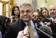 Act MP David Garrett is confronted by media over his assault conviction. Photo / Mark Mitchell Act MP David Garrett is confronted by media over his assault conviction. Photo / Mark Mitchell