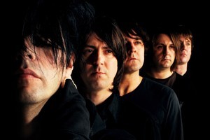 The Charlatans' drummer Jon Brookes (fourth from left) has been diagnosed with a brain tumour. Photo / Supplied