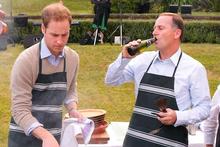 Prince William attends a barbecue at Premier House with John Key. Photo / Getty Images Prince William attends a barbecue at Premier House with John Key. Photo / Getty Images