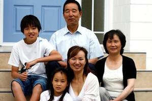 Ally Wang with her father Zhi Wang, mother Ying Xu, son Kevin Sun and daughter Cathy Sun. Photo / Dean Purcell