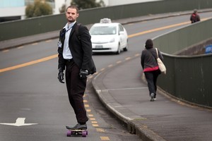 There is nothing illegal about skateboarding on the road, as long as you stick to the road rules like drivers of other vehicles. Photo / Doug Sherring