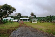 The Sagale family now have two two bedroom houses and an open fale, in front is the grave of Taua. Photo / Cherelle Jackson The Sagale family now have two two bedroom houses and an open fale, in front is the grave of Taua. Photo / Cherelle Jackson