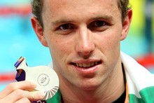 Daniel Bell holds his silver medal. Photo / Getty Images Daniel Bell holds his silver medal. Photo / Getty Images