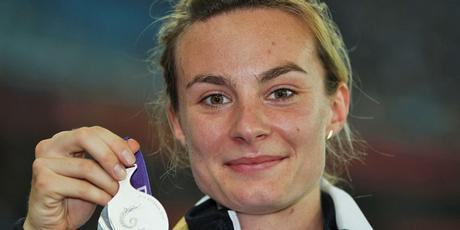 Silver medalist Nikki Hamblin of New Zealand celebrates with her medal on the podium after the women's 1500 metres final. Photo / Getty Images Silver medalist Nikki Hamblin of New Zealand celebrates with her medal on the podium after the women's 1500 metres final. Photo / Getty Images