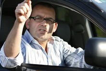 Paul Henry gestures to reporters after his suspension. Photo / NZ Herald Paul Henry gestures to reporters after his suspension. Photo / NZ Herald