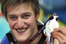 New Zealand swimmer Gareth Kean with his silver medal. Photo / Brett Phibbs New Zealand swimmer Gareth Kean with his silver medal. Photo / Brett Phibbs