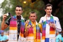 Silver medallist Hayden Roulston on the dias for the Men's Road Race. Photo / Getty Images Silver medallist Hayden Roulston on the dias for the Men's Road Race. Photo / Getty Images