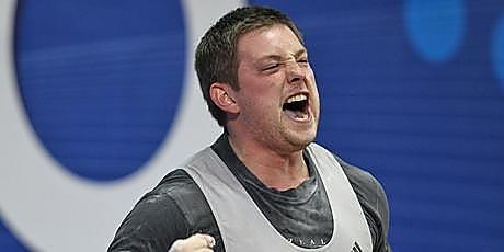 Stanislav Chalaev celebrates his final lift that earned him a silver medal. Photo / Getty Images Stanislav Chalaev celebrates his final lift that earned him a silver medal. Photo / Getty Images