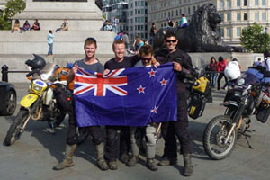 Celebrating journey's end by Nelson's Column in Trafalgar Square, London. Photo / Rob Gray