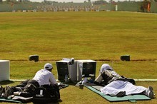Mike Collings and John Snowden compete in the 500 yards Pairs Full Bore Open. Photo / Getty Images Mike Collings and John Snowden compete in the 500 yards Pairs Full Bore Open. Photo / Getty Images