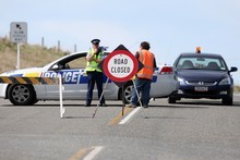 Police cordon off State Highway 93 after the fatal accident between Mataura and Clinton. Photo / NZPA. Police cordon off State Highway 93 after the fatal accident between Mataura and Clinton. Photo / NZPA.