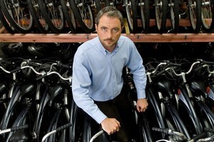 NextBike director Julian Hulls with the hire bikes they have had to pull from Auckland Streets. Photo / Richard Robinson.