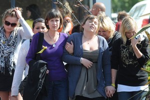 Family members after they had been told that a second explosion in the Pike River Coal Mines that they didn't expect any of the 29 miners and contractors trapped underground would be found alive. Photo / NZPA