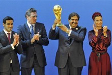 The delegates from Qatar celebrate after winning the hosting rights to the the 2022 Soccer World Cup. Photo / AP The delegates from Qatar celebrate after winning the hosting rights to the the 2022 Soccer World Cup. Photo / AP