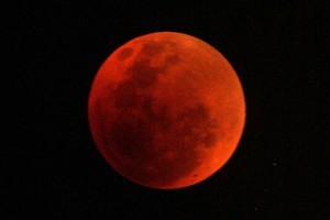 The moon turns red during the 2007 lunar eclipse. Photo / Alan Gibson