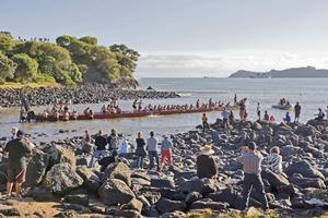 A crew of paddlers board the waka Ngatokimatawhaorua at Waitangi today to take part in a Waka Karakia - its blessing. Photo / NZPA