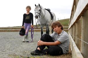 Reilly Webber, pictured with sister Lily, 7, says a neighbour threatened to shoot their pony. Photo / Dean Purcell
