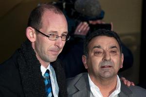 David Bain, flanked by supporter Joe Karam, outside the High Court. Photo / Simon Baker