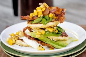 Avocado pikelets, grilled corn, basil and bacon. Photo / Babiche Martens