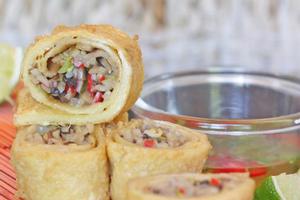 Lace pancake with crab, mushroom and mung beans. Photo / Supplied
