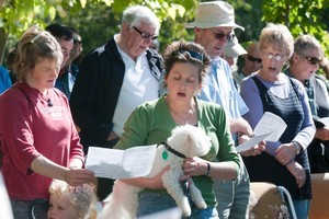 An open air church service at the Christchurch South library in Beckenham. Photo / NZPA