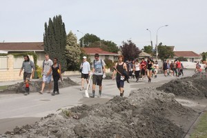 The Student Army on the march in Avondale. Photo / Geoff Sloan