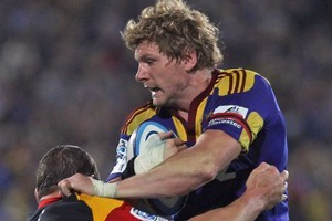 Adam Thomson stole no less than six clean turnovers for the Highlanders against the Chiefs. Photo / Getty Images