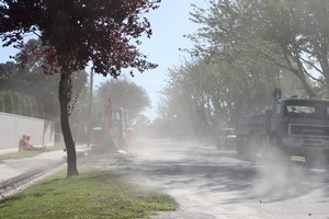 Dust swirling in the wind on a street in Avonside. Photo / Paul Harper