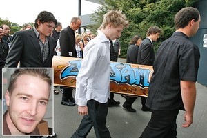 The coffin of earthquake victim Jaime Gilbert, inset, is carried into his funeral at Burnside, Christchurch today. Photos / Brett Phibbs, Supplied