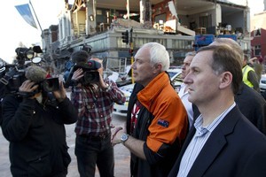 Prime minister John Key (R) and mayor Bob Parker survey damage in the Christchurch CBD. Photo / Simon Baker