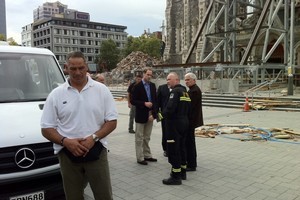 Prince William talks to Dean Peter Beck and a USAR official outside the Christchurch Cathedral. Photo / Fairfax