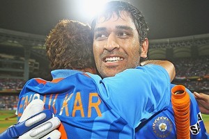 MS Dhoni and Sachin Tendulkar of India celebrate their teams win. Photo / Getty Images