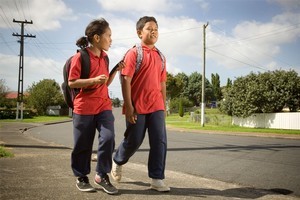 Unaloto Matekuolava and Tone Lopati collect research data as they walk — or wiggle. Photo / The Aucklander