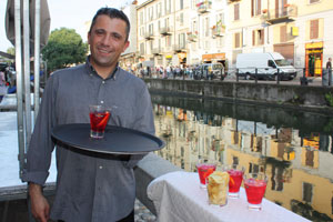 You're never far from a cocktail and a smiling waiter in Milan. Photo / Paul Rush