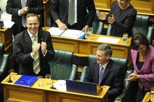 Finance minister Bill English was appaluded after reading the 2011 Budget, which revealed details of cuts to the Working For Families scheme. Photo / NZPA/Ross Setford