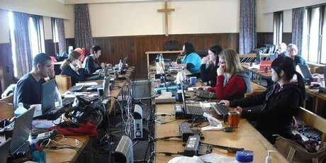 Meridian workers in their temporary offices in the chapel at Wigram air force base. Photo / Supplied Meridian workers in their temporary offices in the chapel at Wigram air force base. Photo / Supplied